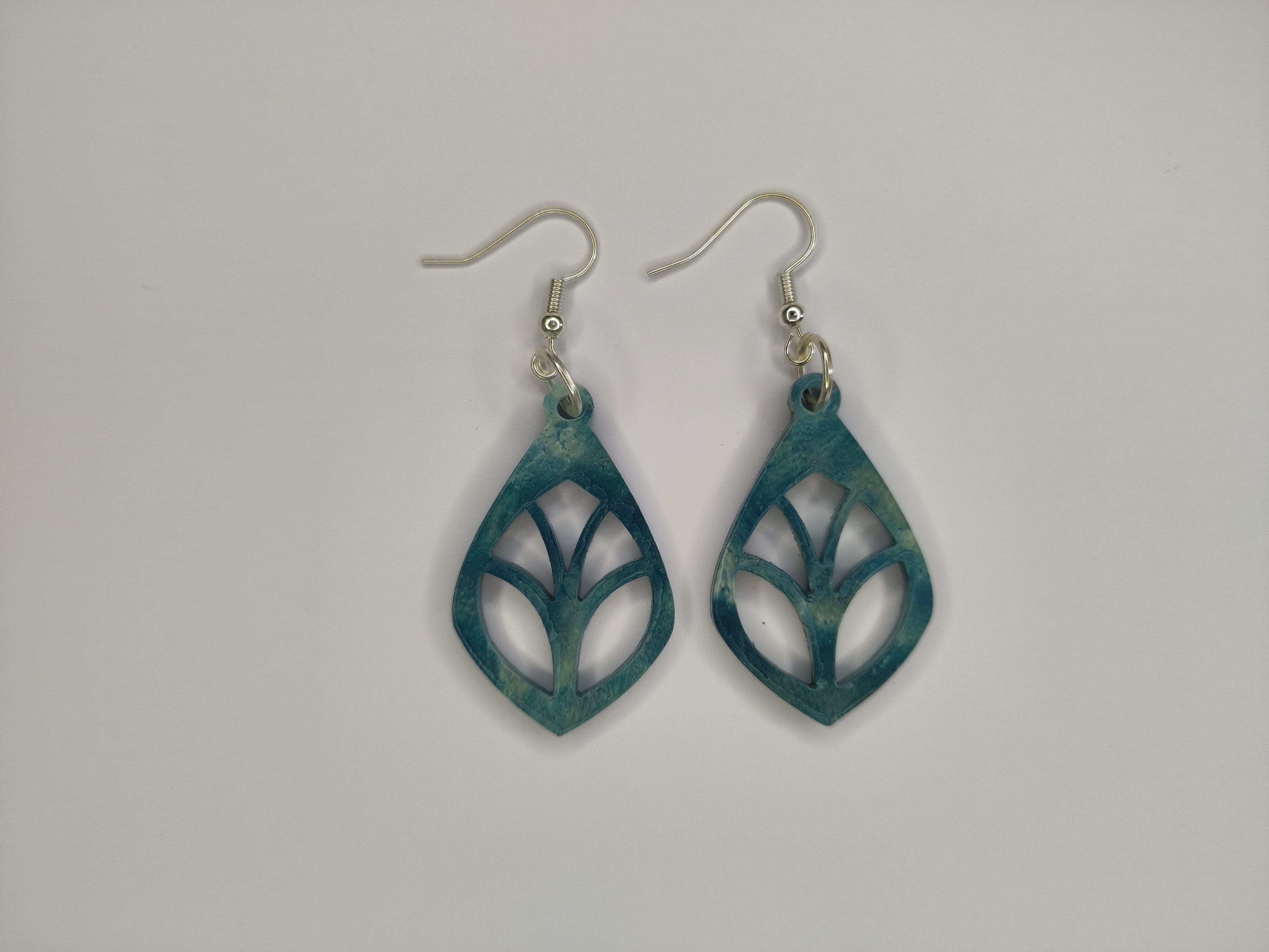 Earrings made our of 3D pritner waste